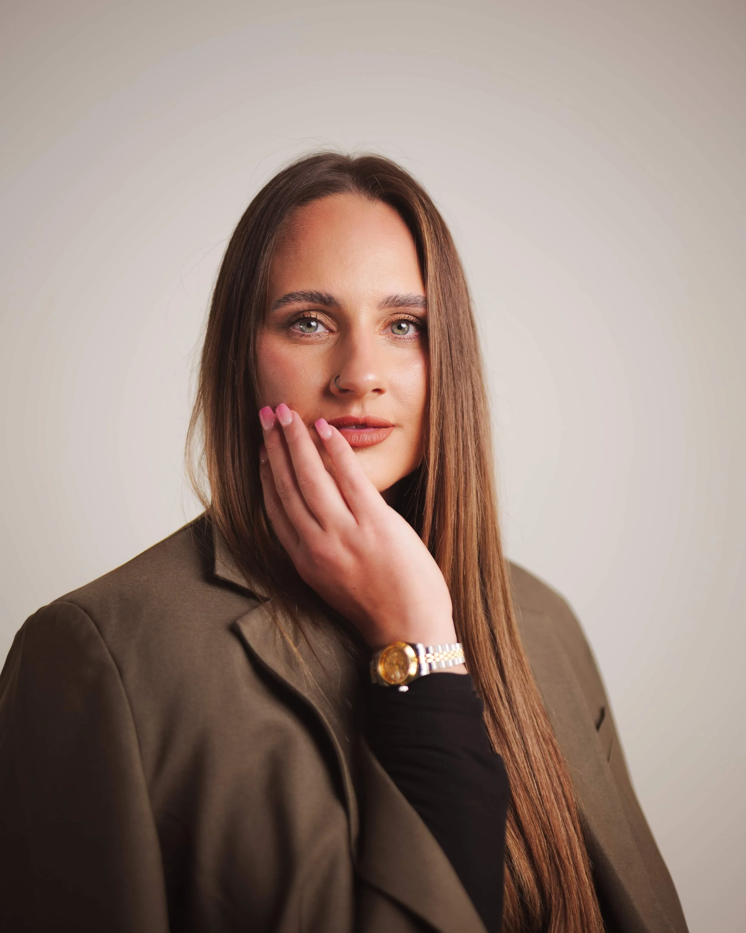 model posing hand on face