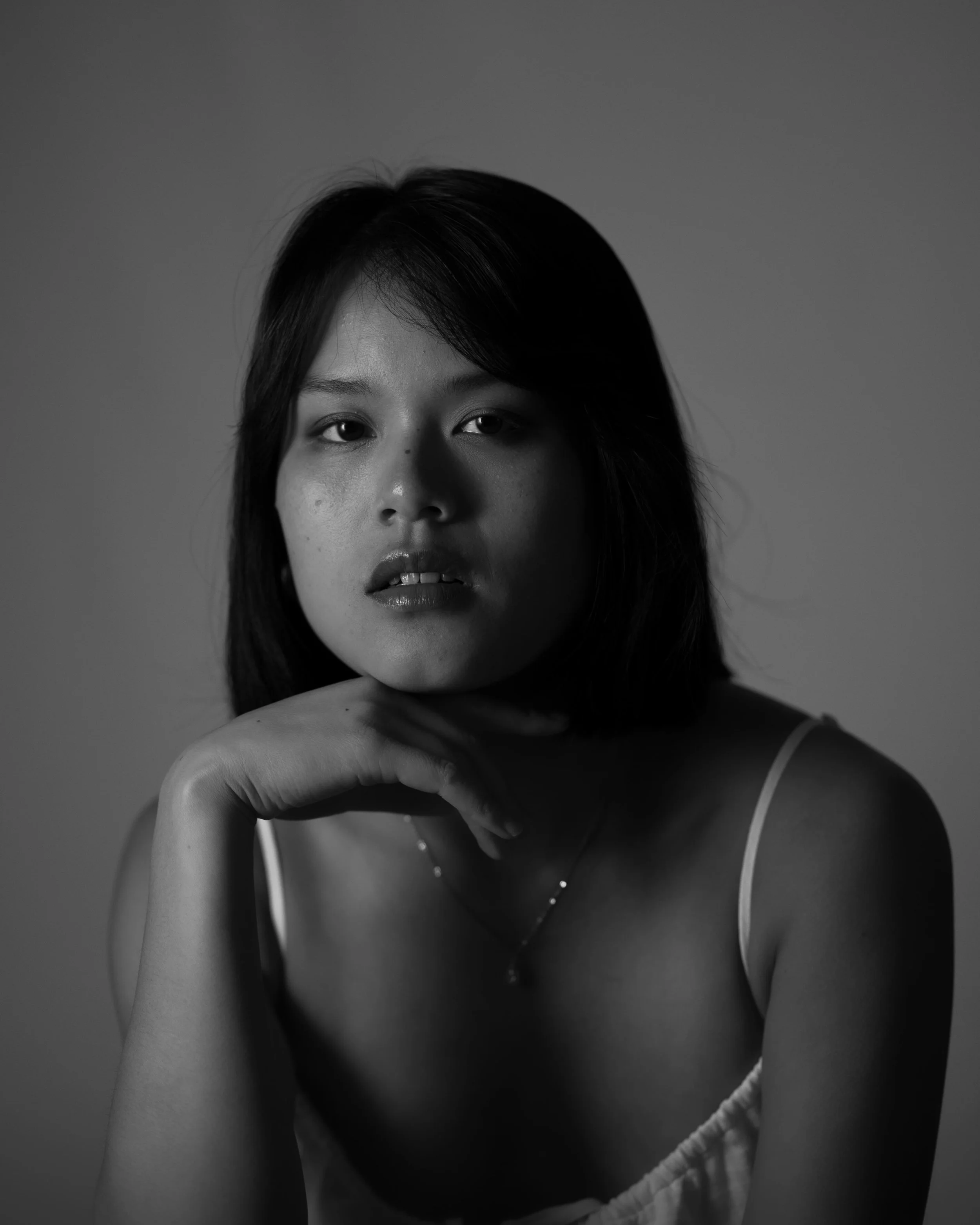 asian woman in black