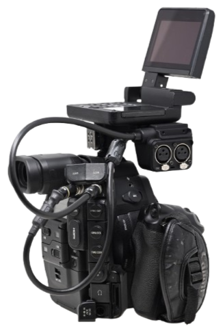 Professional video camera with attached monitor and accessories