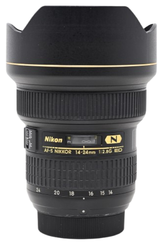 Close-up of a Nikon NIKKOR 14-24mm f/2.8G ED camera lens with a lens hood attached.