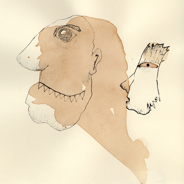 deux visages étranges et inquiétants nés d'une tache de café