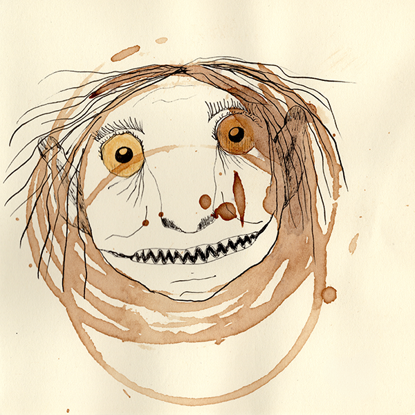 un visage inquiétant sorti d'une tache de café