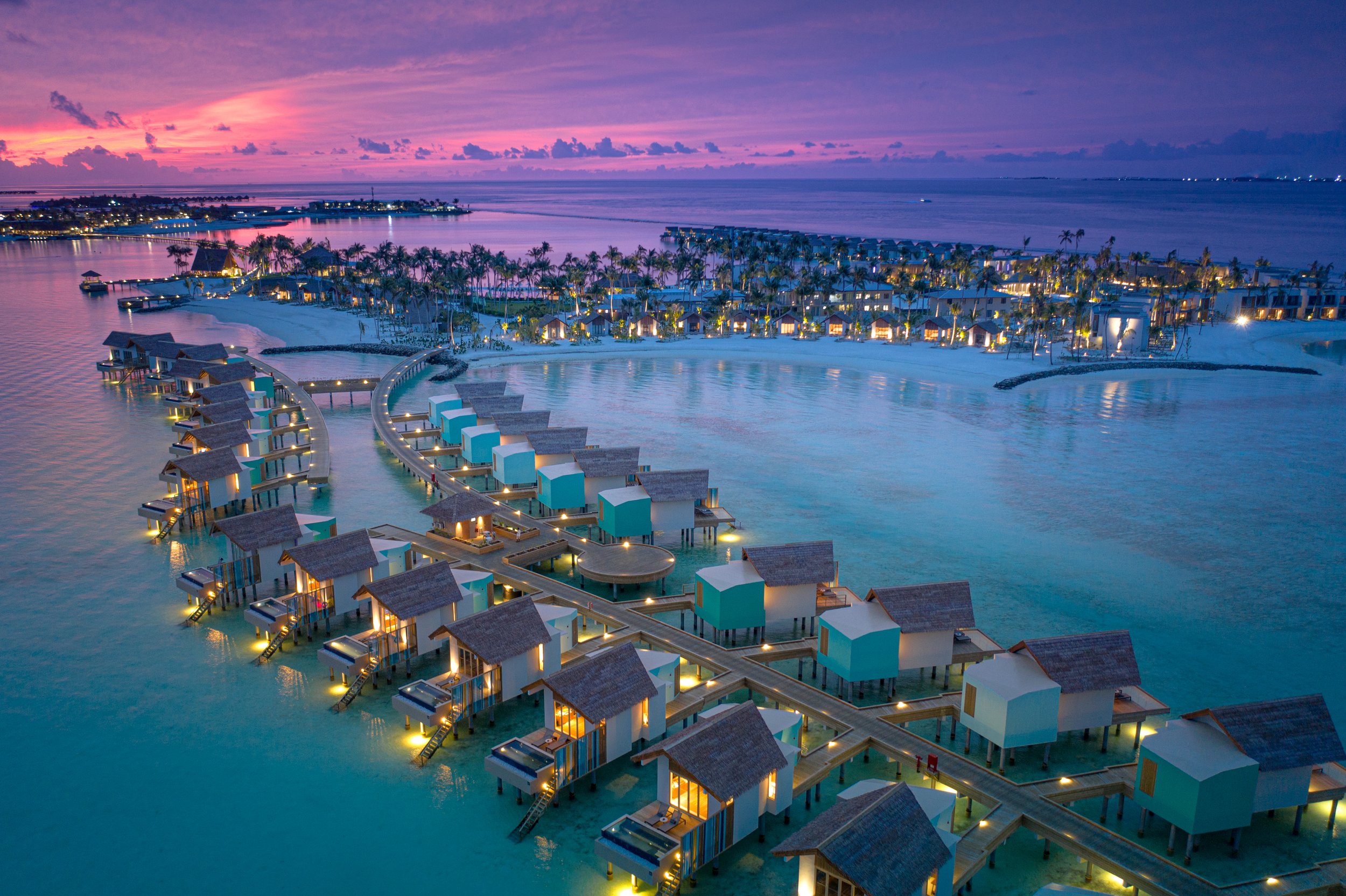 HRHM-Aerial-Sunset-WaterBungalows.jpg