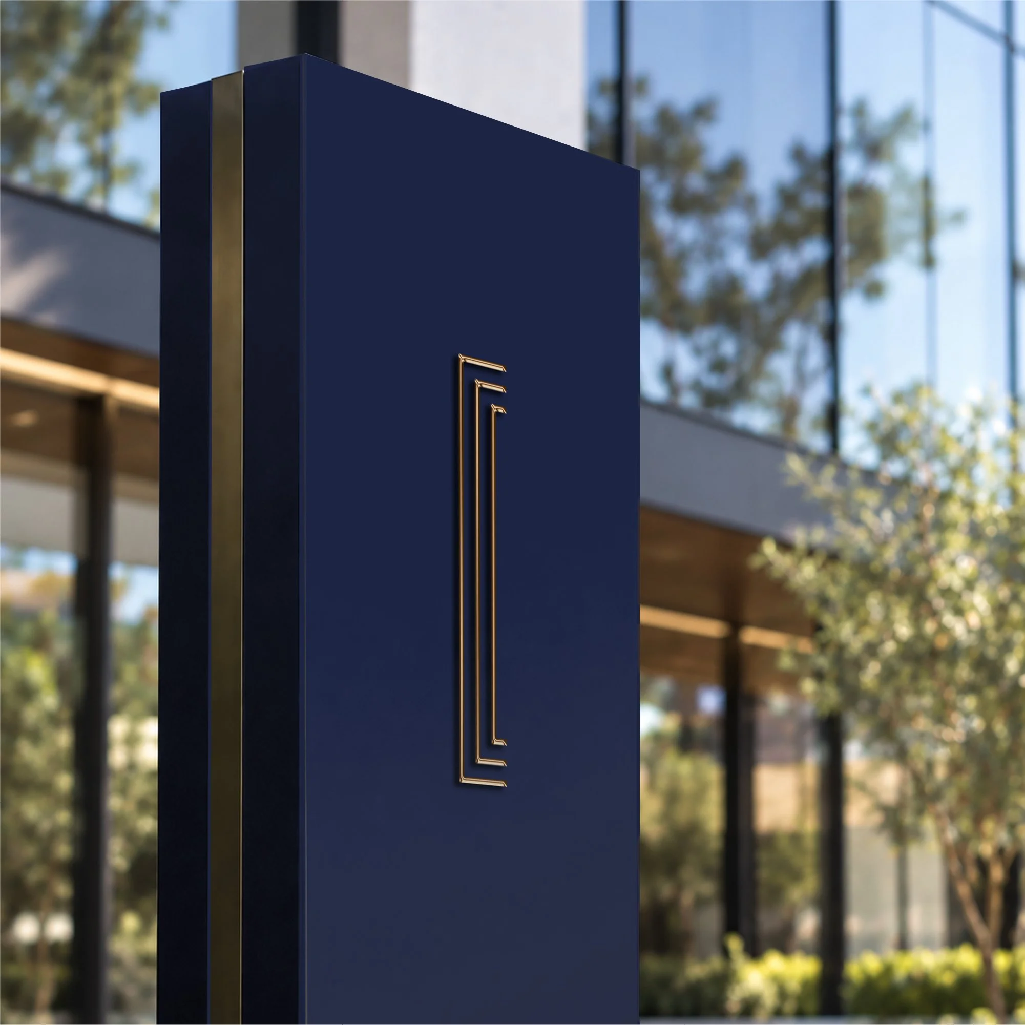 Tall navy blue presentation box render with gold trim set against glass architectural exterior.