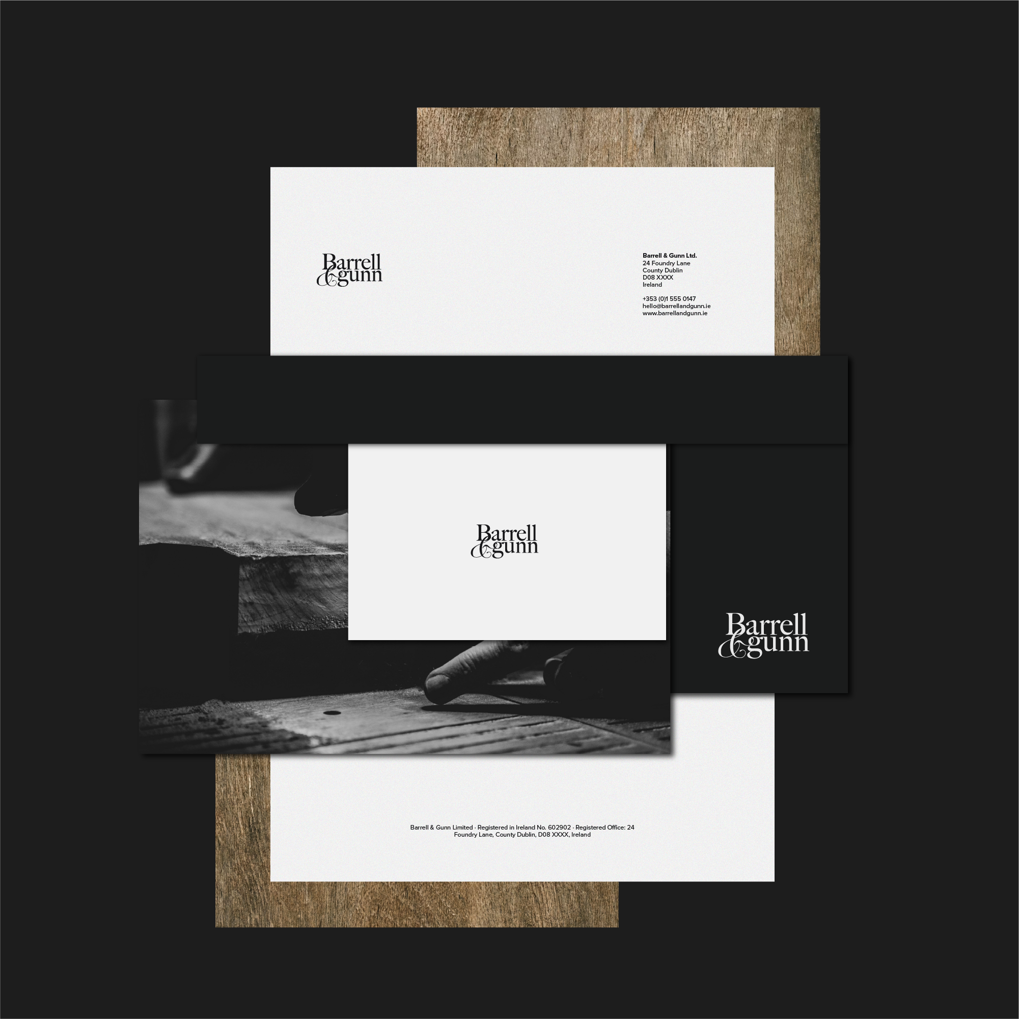 Black and white promotional business cards with textured backgrounds, featuring the logo and contact information for Barrell & Gunn Ltd.