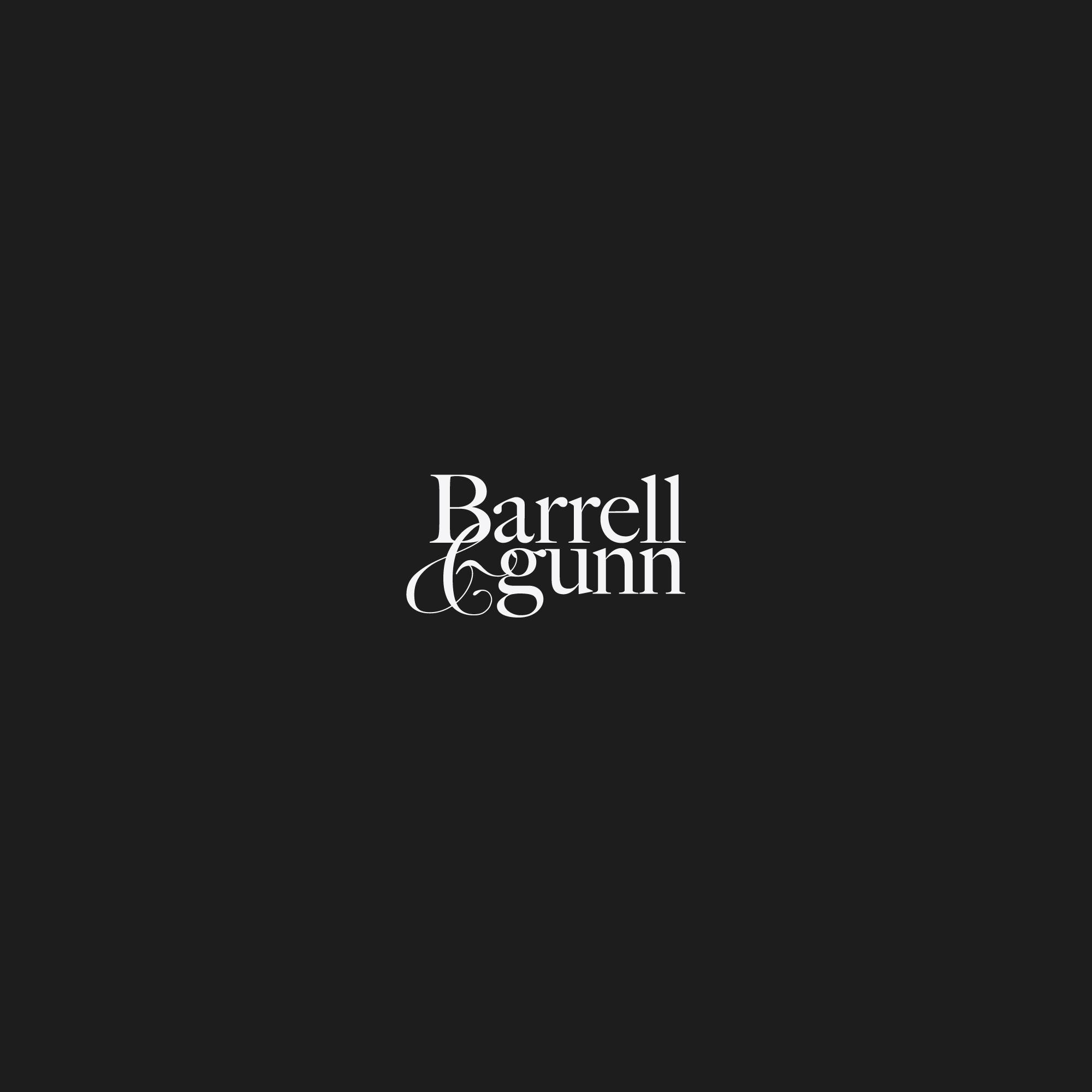 Black & White Logo Design that says 'Barrell & Gunn' in white serif font.
