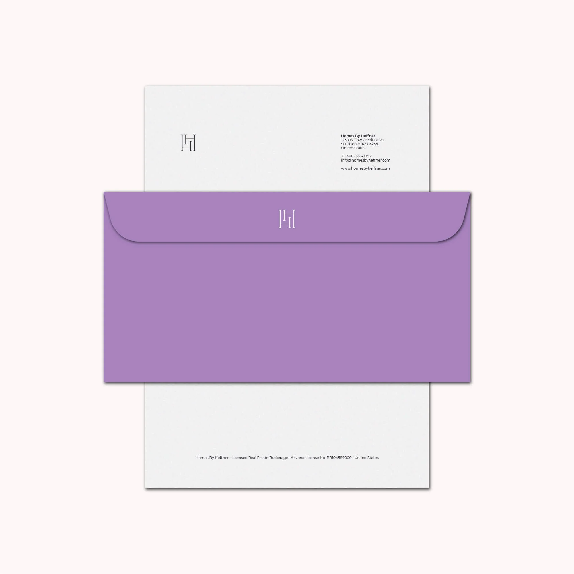 dl envelope and letterhead for for reatlor homes by heffner real estate brand