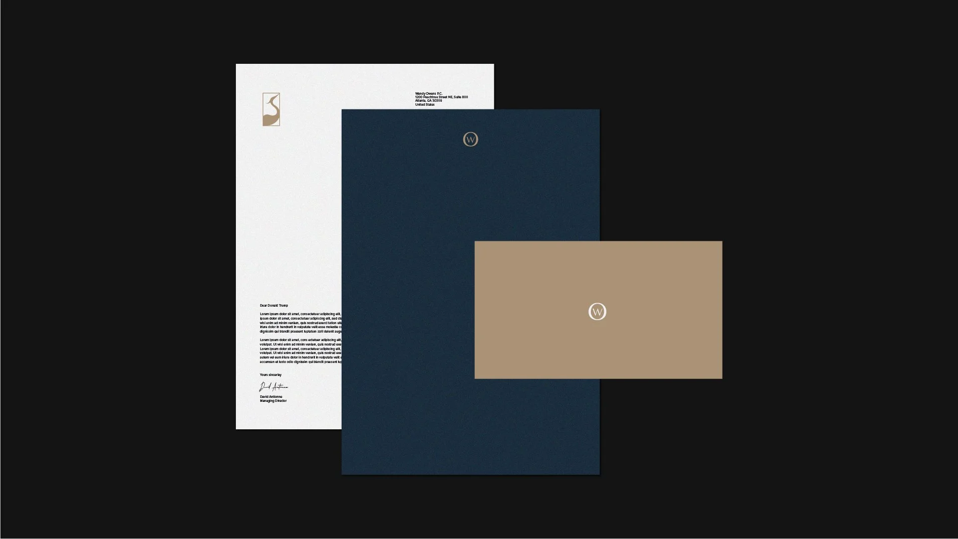 A set of branded stationery including white, navy blue, and beige folders and envelopes with logo and text, placed on a black background.