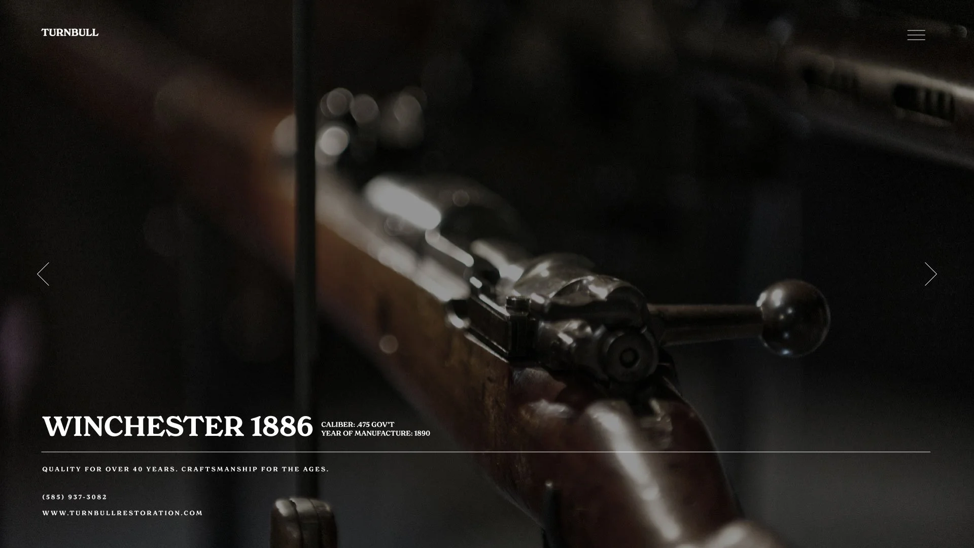 Close-up of a vintage Winchester 1886 rifle showing the bolt, stock, and trigger mechanism.