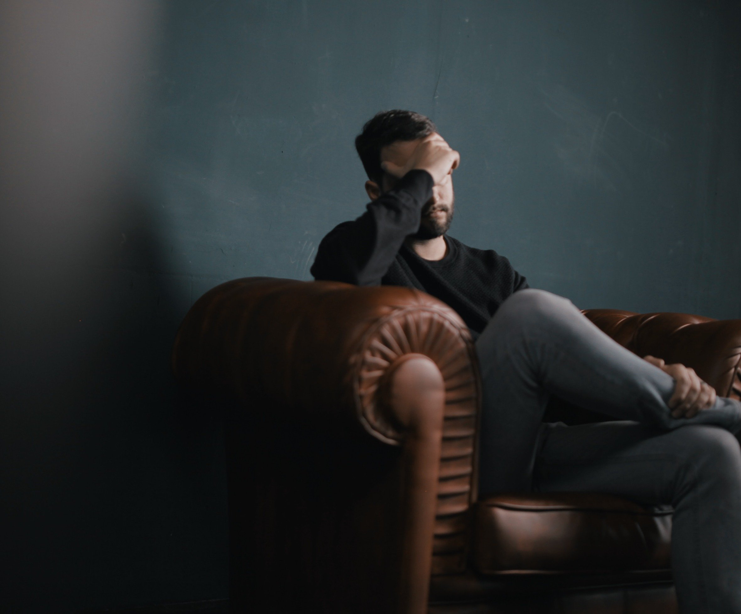 Business owner under workplace stress before stress coaching