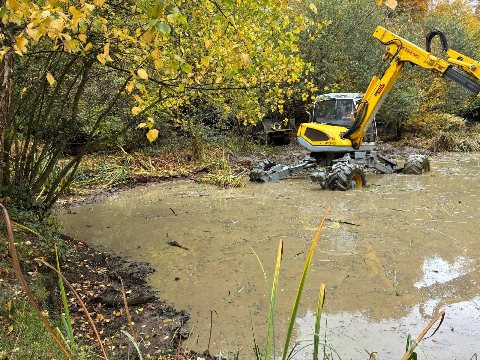 Pond de-silting and creation using the Menzi Muck