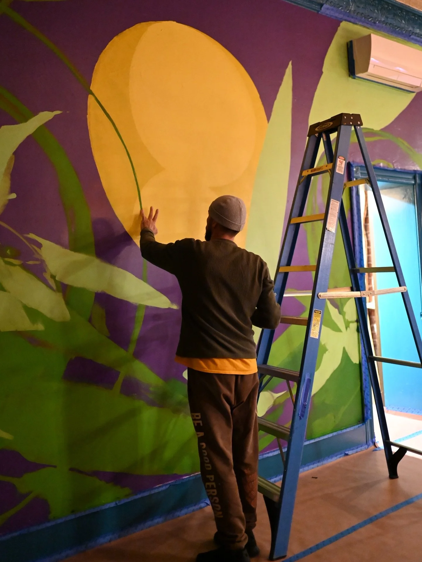 Feeling so blessed and honored to have our walls painted with @mr_mustart beautiful magic. Thank you for sharing your medicine all over our soon to be community space. Here's a little sneak peak. We cannot WAIT for you all to see this beauty in perso
