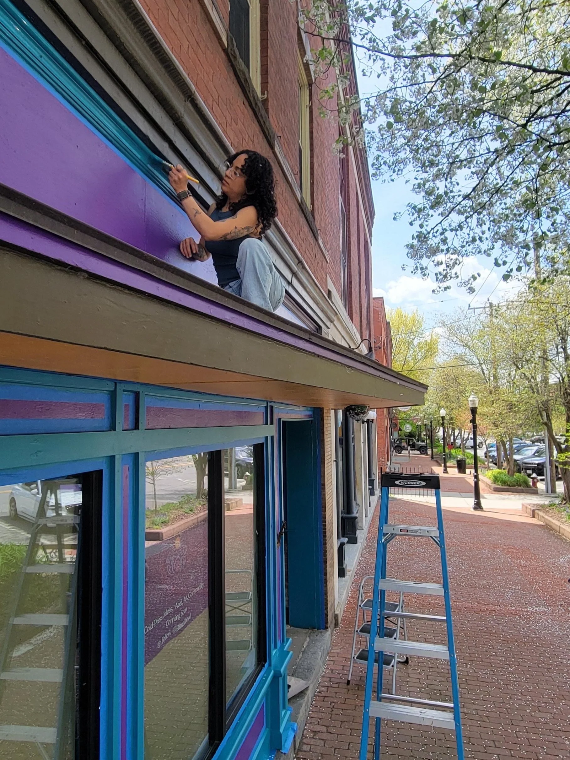 A couple updates from this last month, if you haven't seen her, she's purple and teal 💜🦋. So excited to brighten up this side of the street with some color! Also met some really sweet folks while painting. Were working really hard to be open by nex