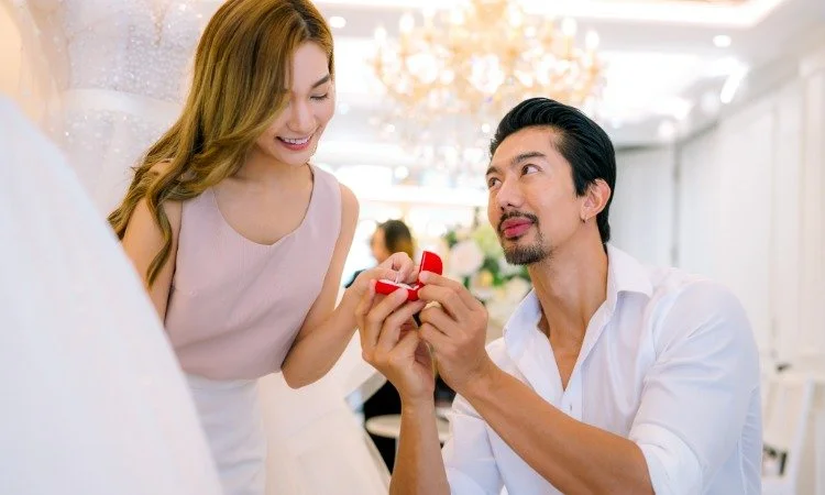 Joyful Proposal Moment Inside a Bridal Boutique.jpeg