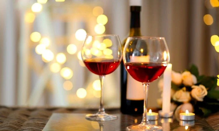 Romantic Red Wine Toast with Candlelight & Roses.jpeg