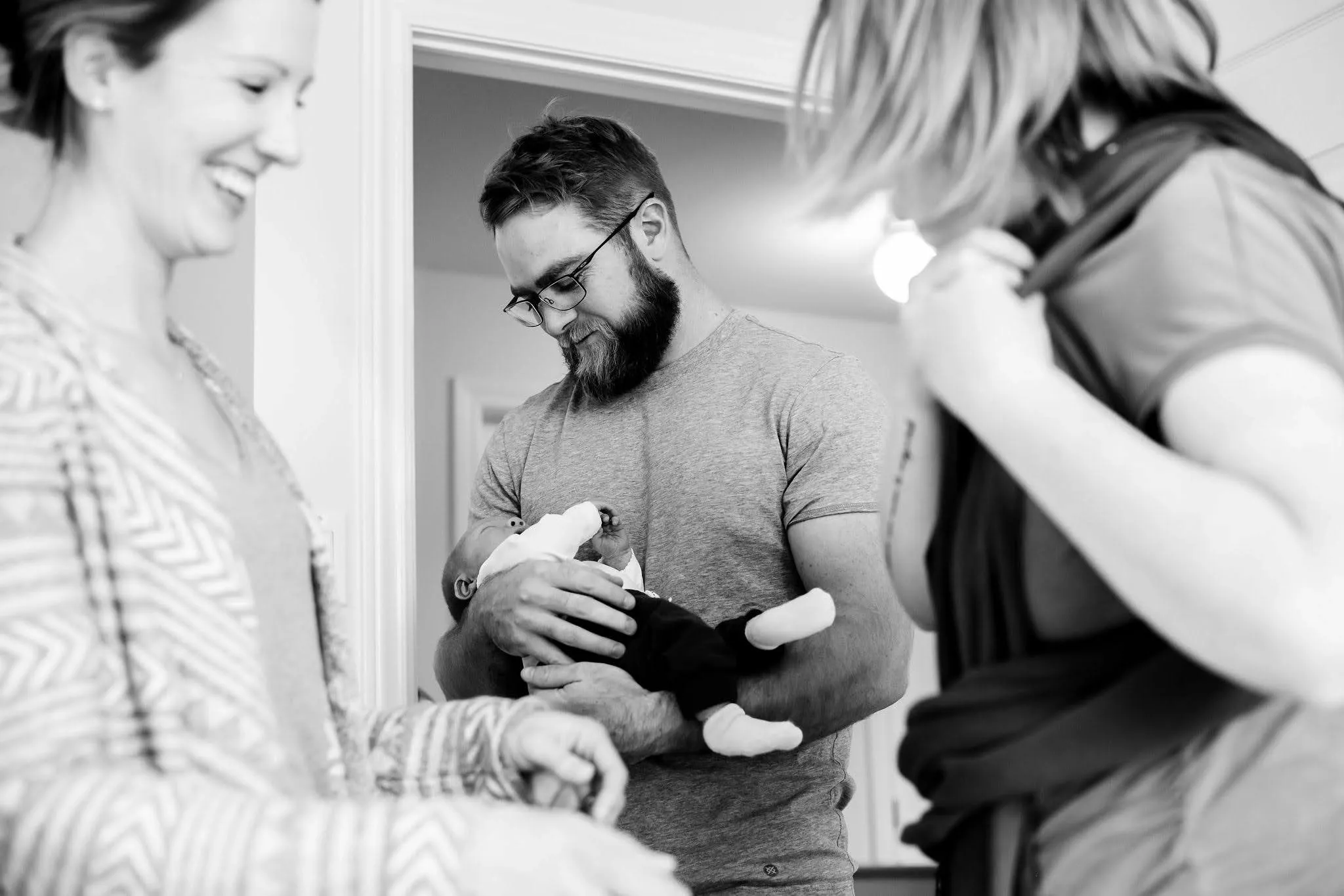 Postpartum Doula supports family with newborn care at home in Marquette.