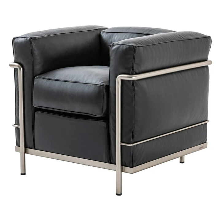 the classic Le Corbusier Grand Confort chair, which is a big plump leather square within a tubular steel frame