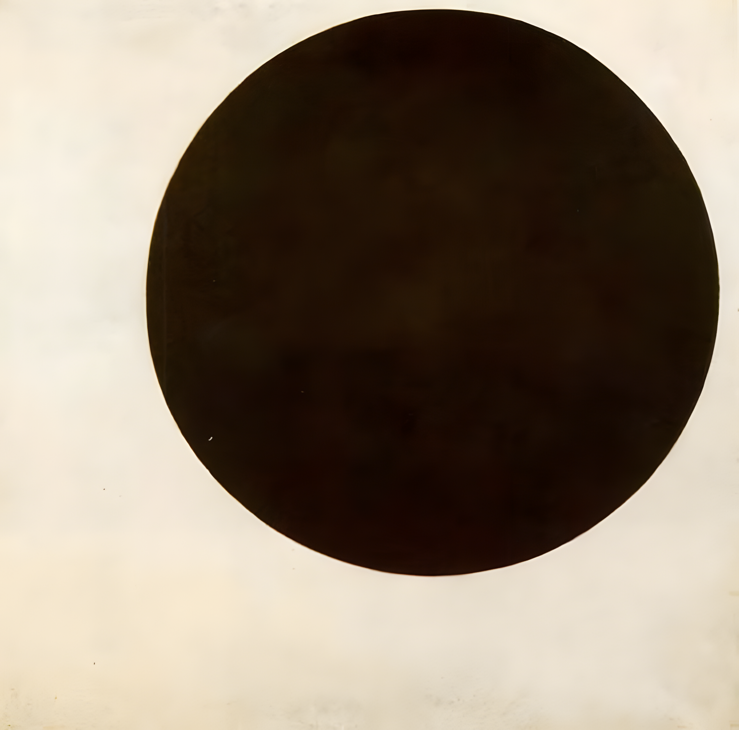A painting by Malevich of an off-white square with a black circle positioned upper right