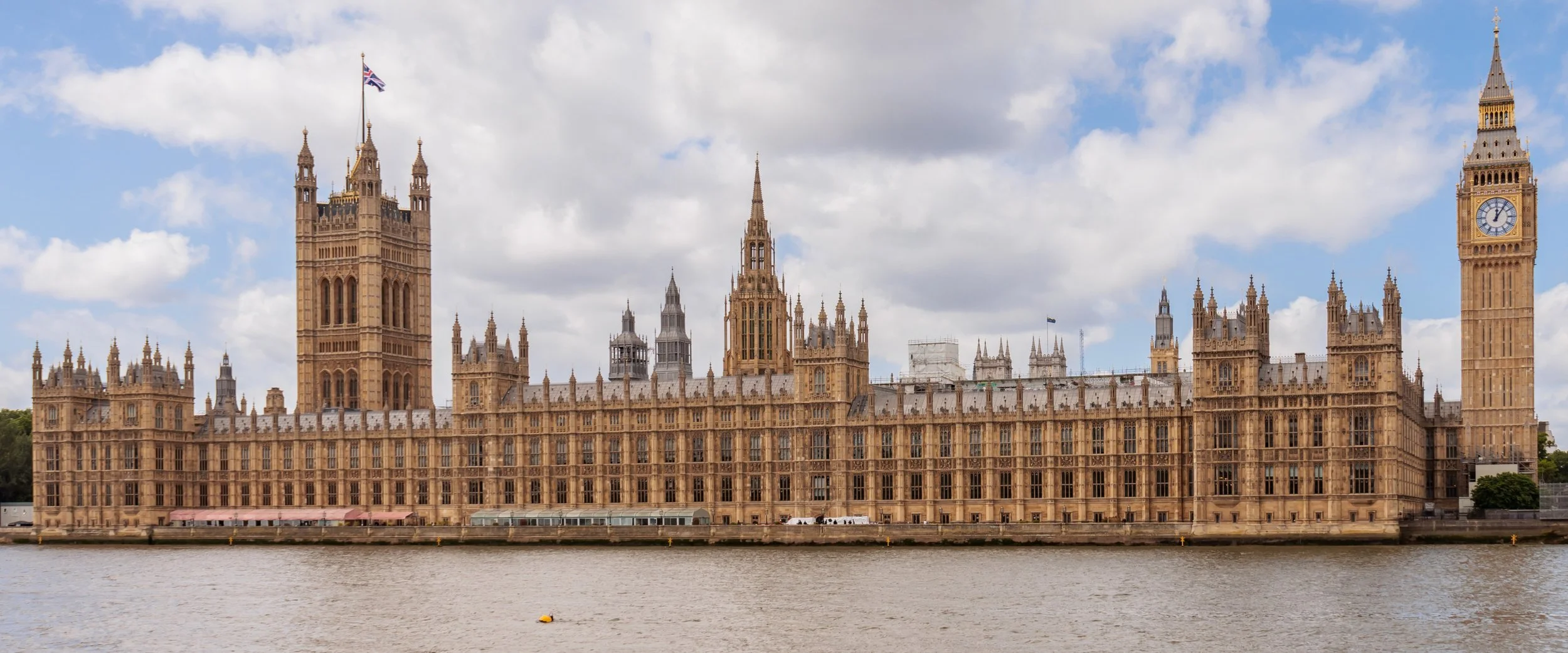Exterior of the Palace of Westminster showing Gothic Revival architecture.