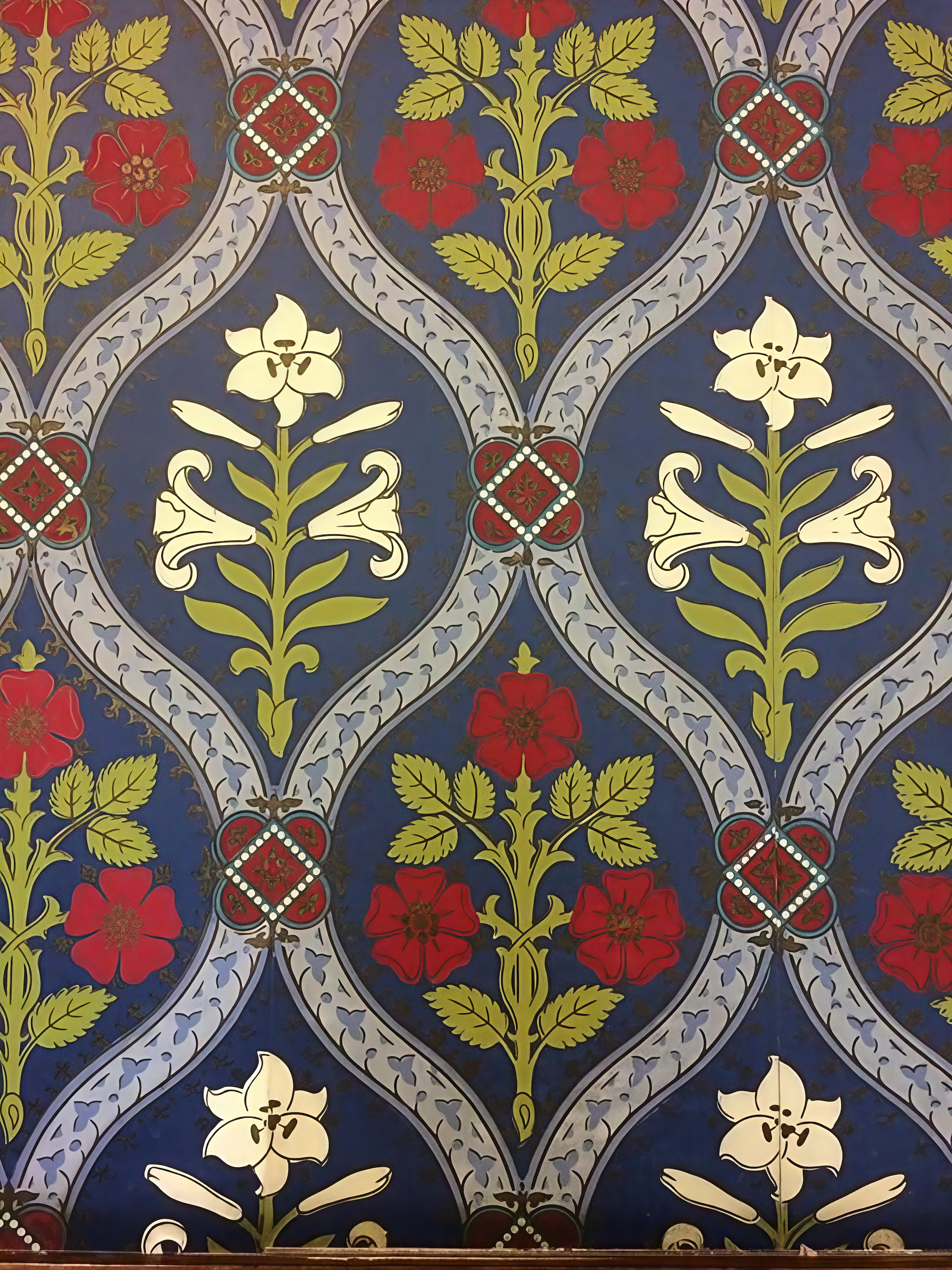Wallpaper with Lillys and Tudor roses, showing how Pugin adapted a Medieval design to align with Design Reform principles:  two-dimensional, like the paper and wall, and stylized to modernize