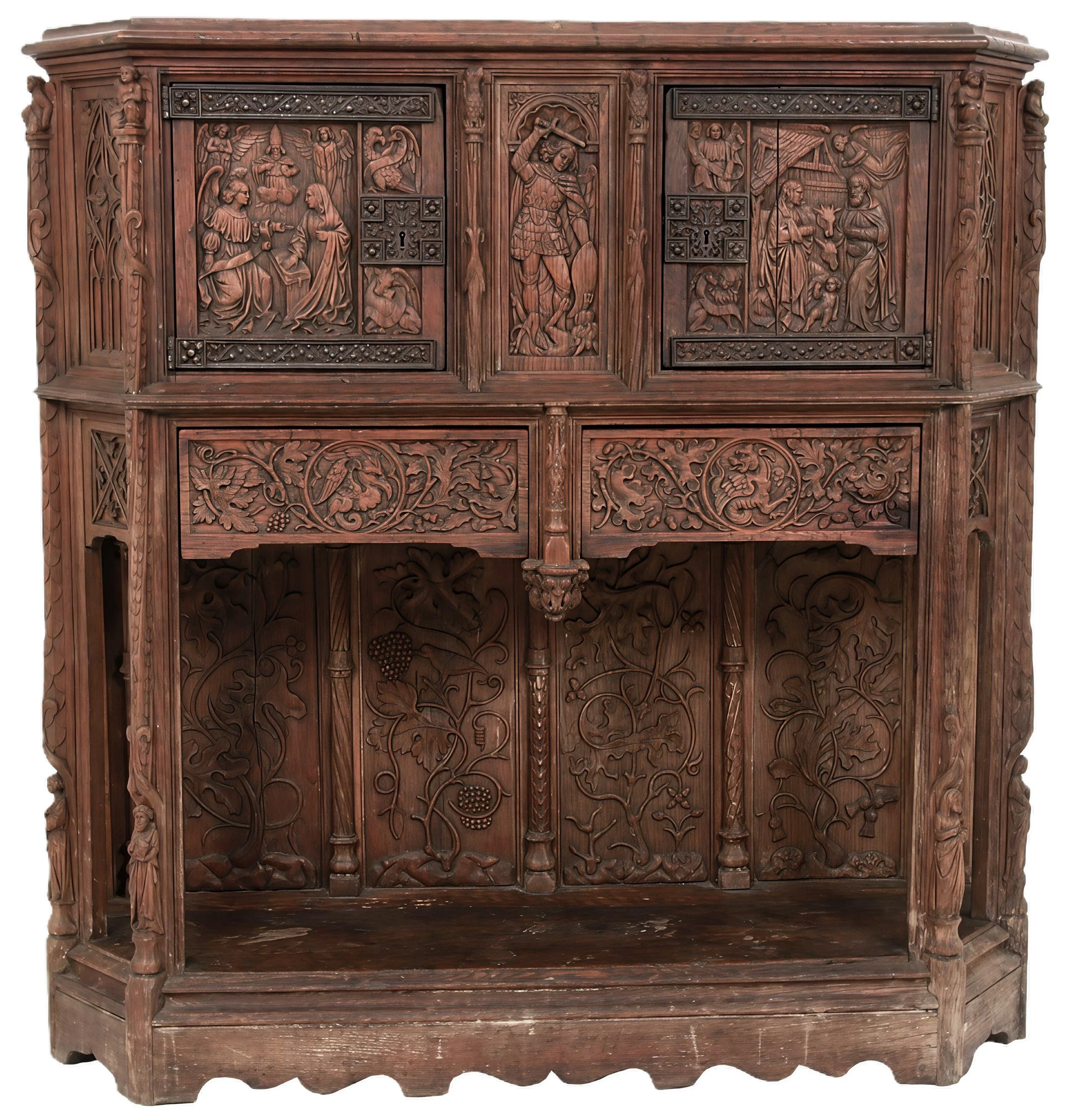 16th-century Gothic court cupboard with carved Late Medieval ornament to show where Morris and other reformers found inspiration