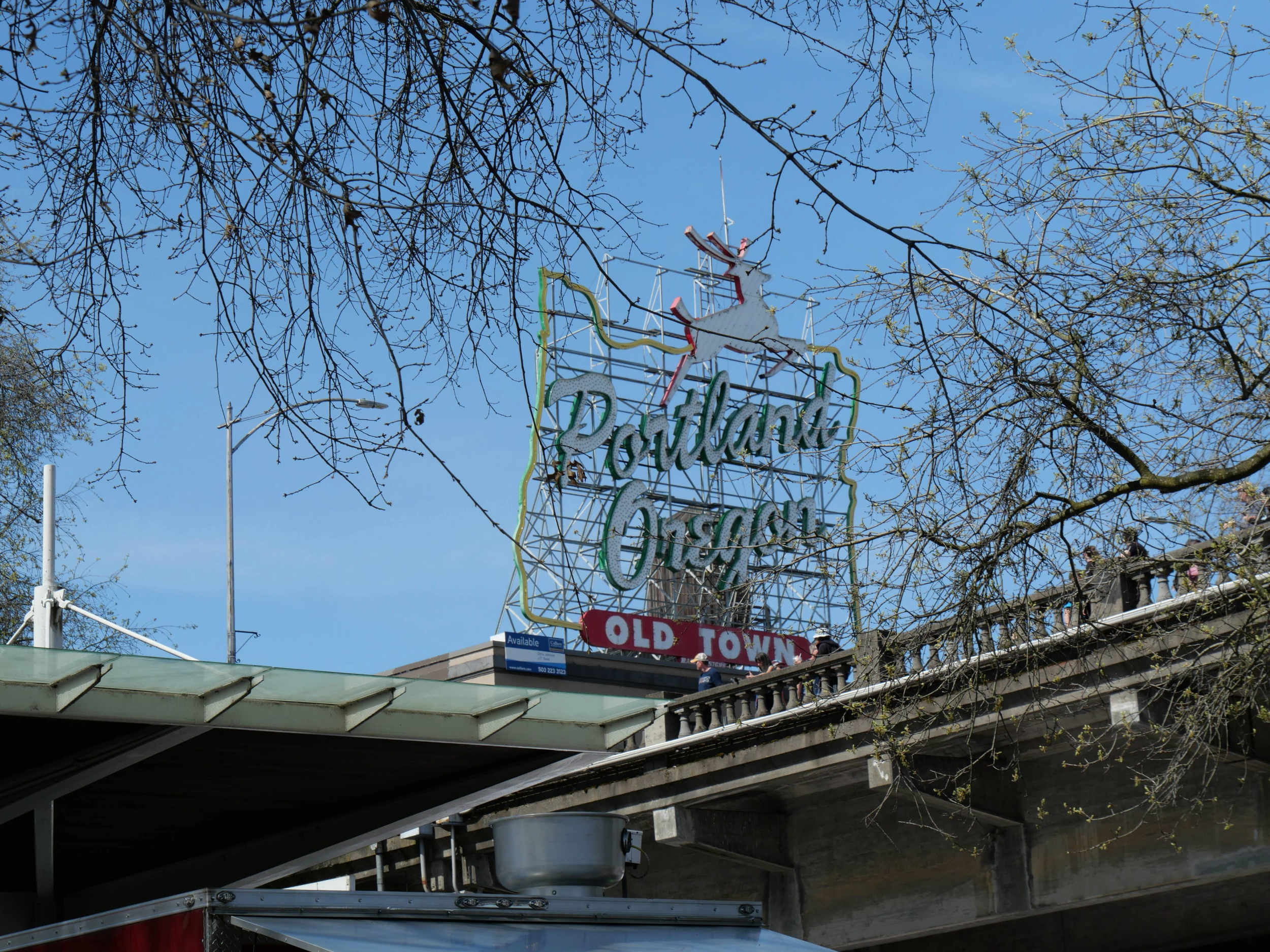 The Portland stag sign as seen from the waterfront | Shot on Lumix G100D