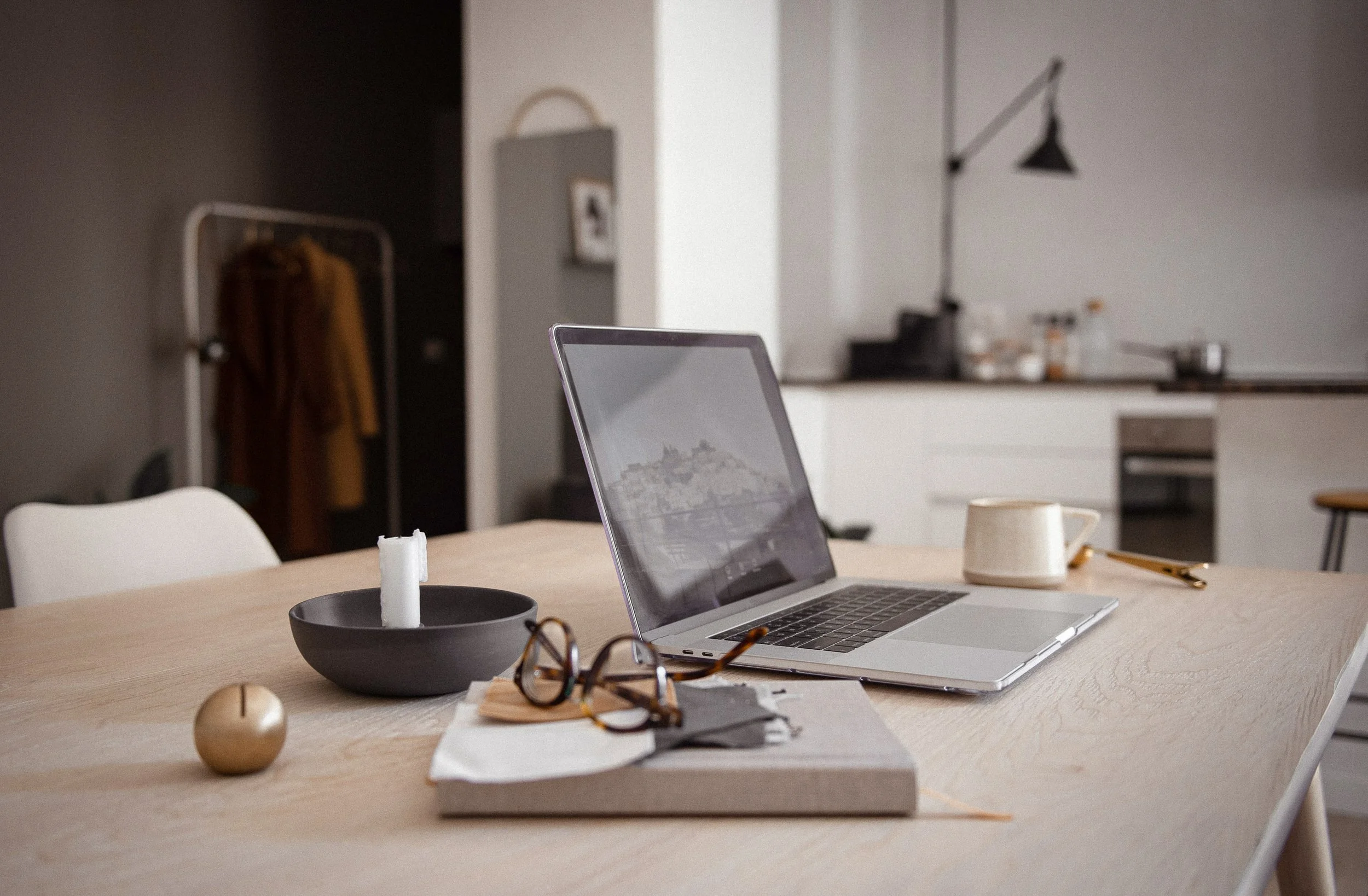 Laptop and workspace setup used for building a custom one-day website, representing streamlined, fast web design.