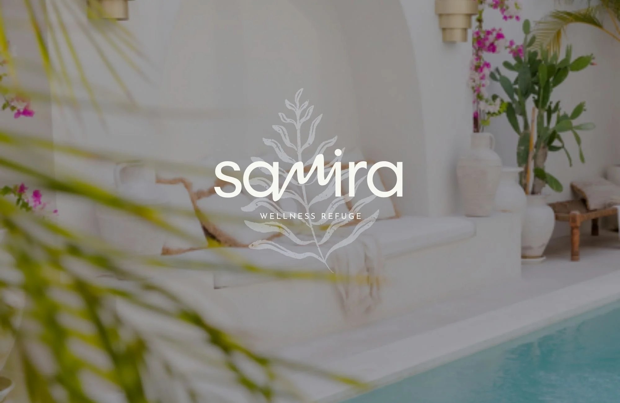 Luxury wellness retreat brand identity featuring calm coastal architecture and serene resort atmosphere.