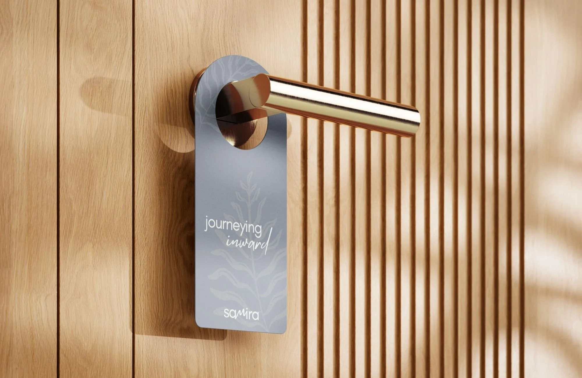 Door hanger design for a wellness-focused hospitality experience with minimalist, calming branding.