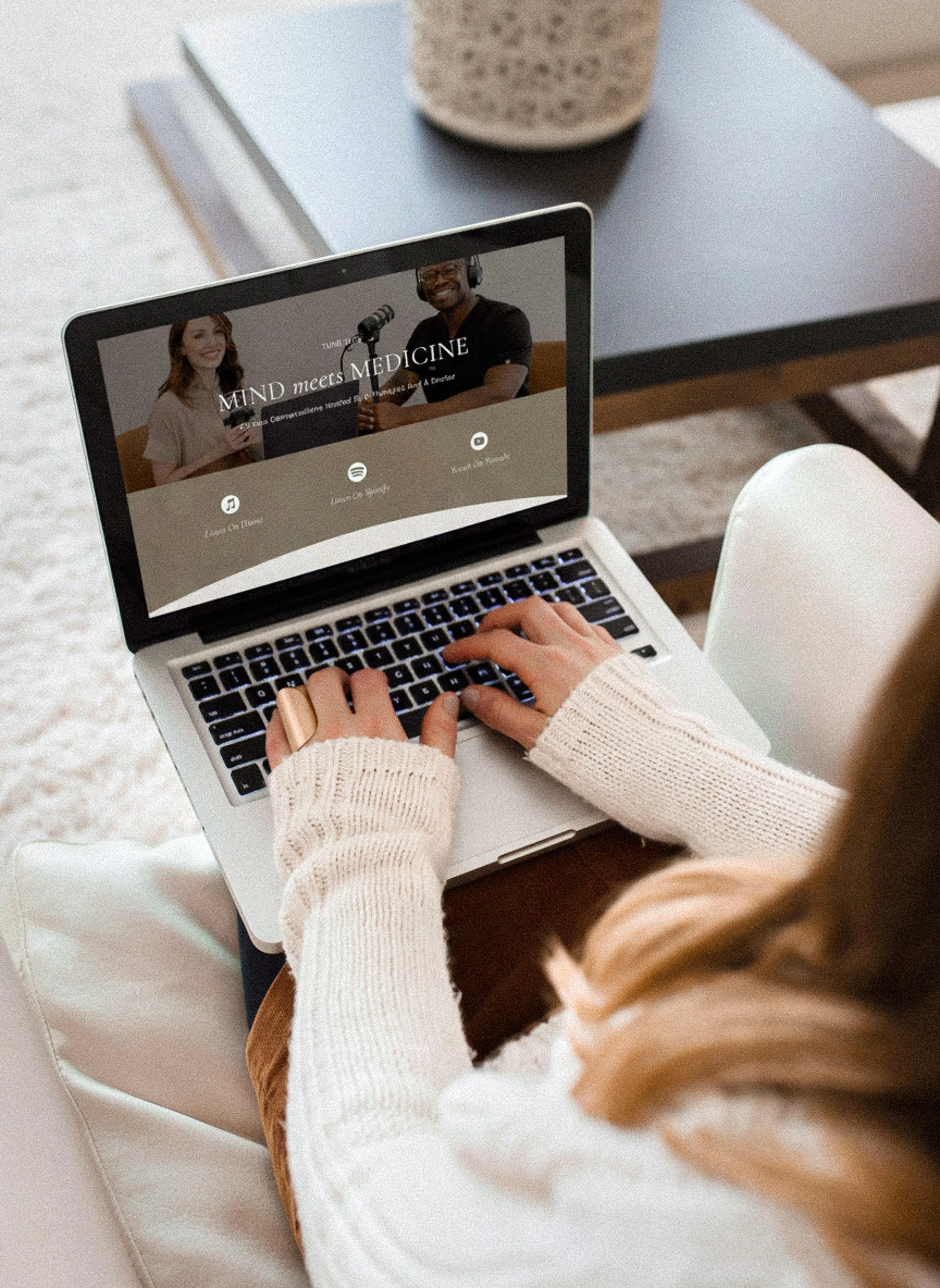 Woman working on a laptop reviewing a website design mockup created by Aviso Studios, a Santa Cruz California web design studio.