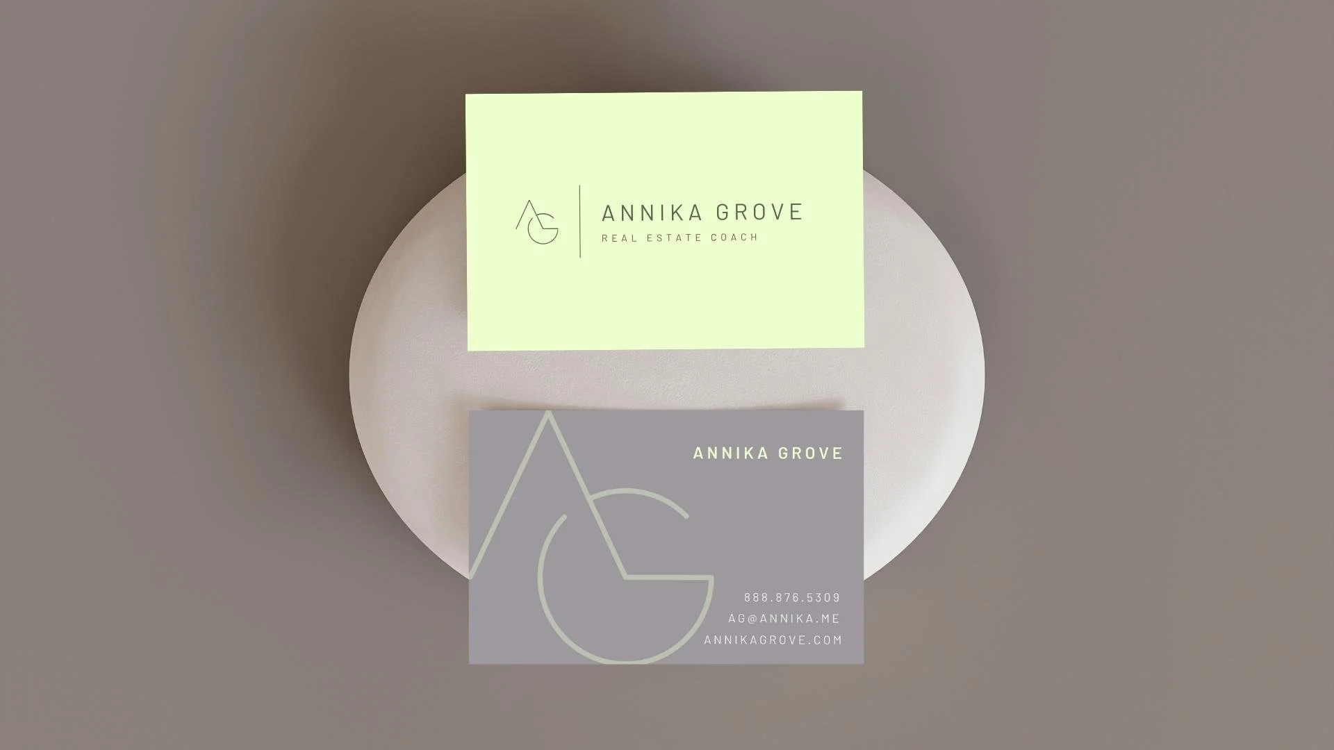 Flatlay of businss card designs for a real estate coach marketing