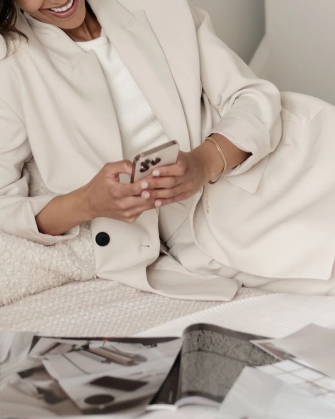 Business owner checking phone after improving Google Business Profile visibility.