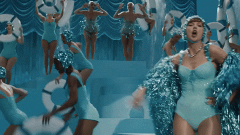 Gif of Taylor Swift as a showgirl as a metaphor for distracting website effects.