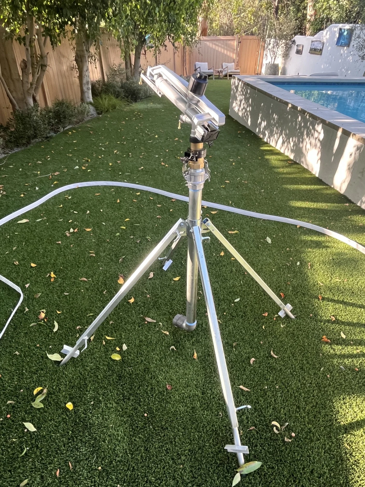 Folding 15 inch portable sprinkler with adjustable legs.jpeg