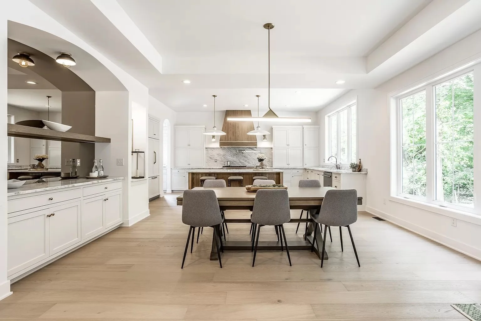 Professionally staged Indianapolis home showcasing open kitchen and dining layout to highlight flow, scale, and buyer appeal