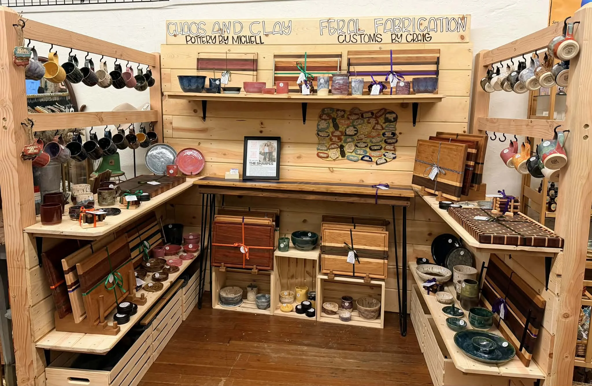 view of one of the vendors inside the shop window at the Vintage Hideaway showing antiques, and vintage items