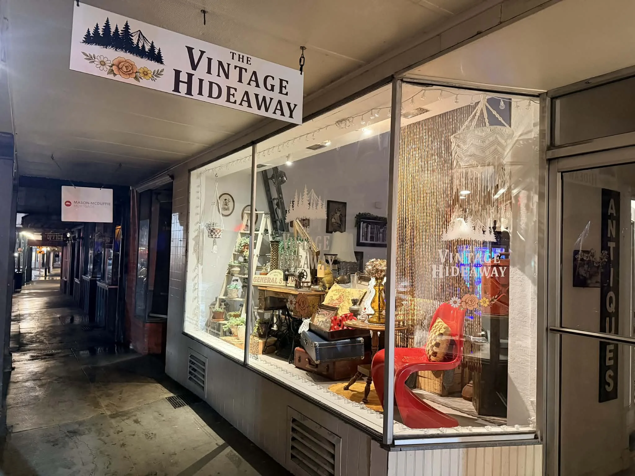 outside view of shop window at the Vintage Hideaway showing antiques, and vintage items