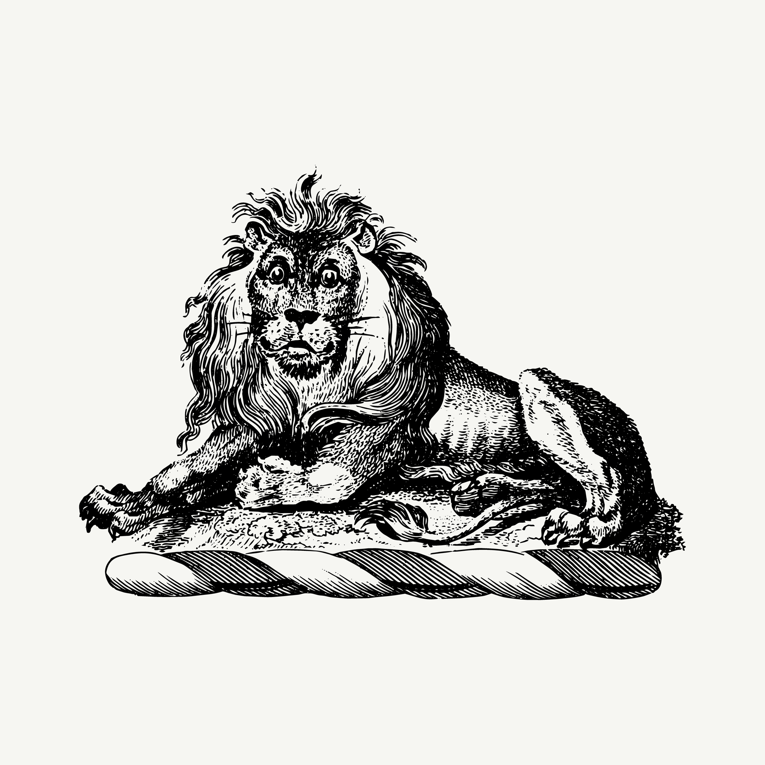 Engraved heraldic crest of a lion lying down
