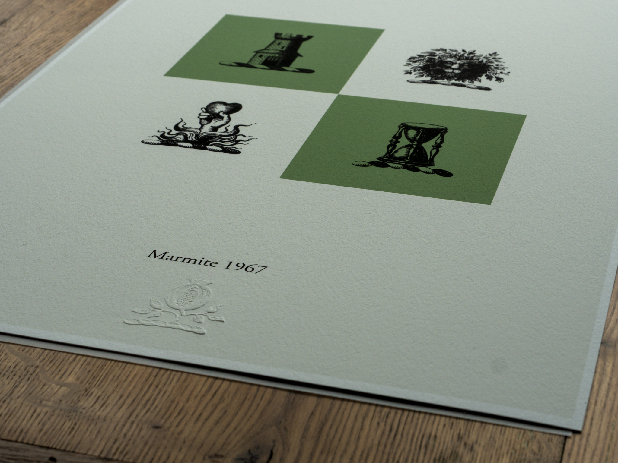 Close-up of a card with four illustrations, two of which are highlighted with verdant backgrounds. The illustrations depict  Text at the bottom reads 'Marmite 1967'.