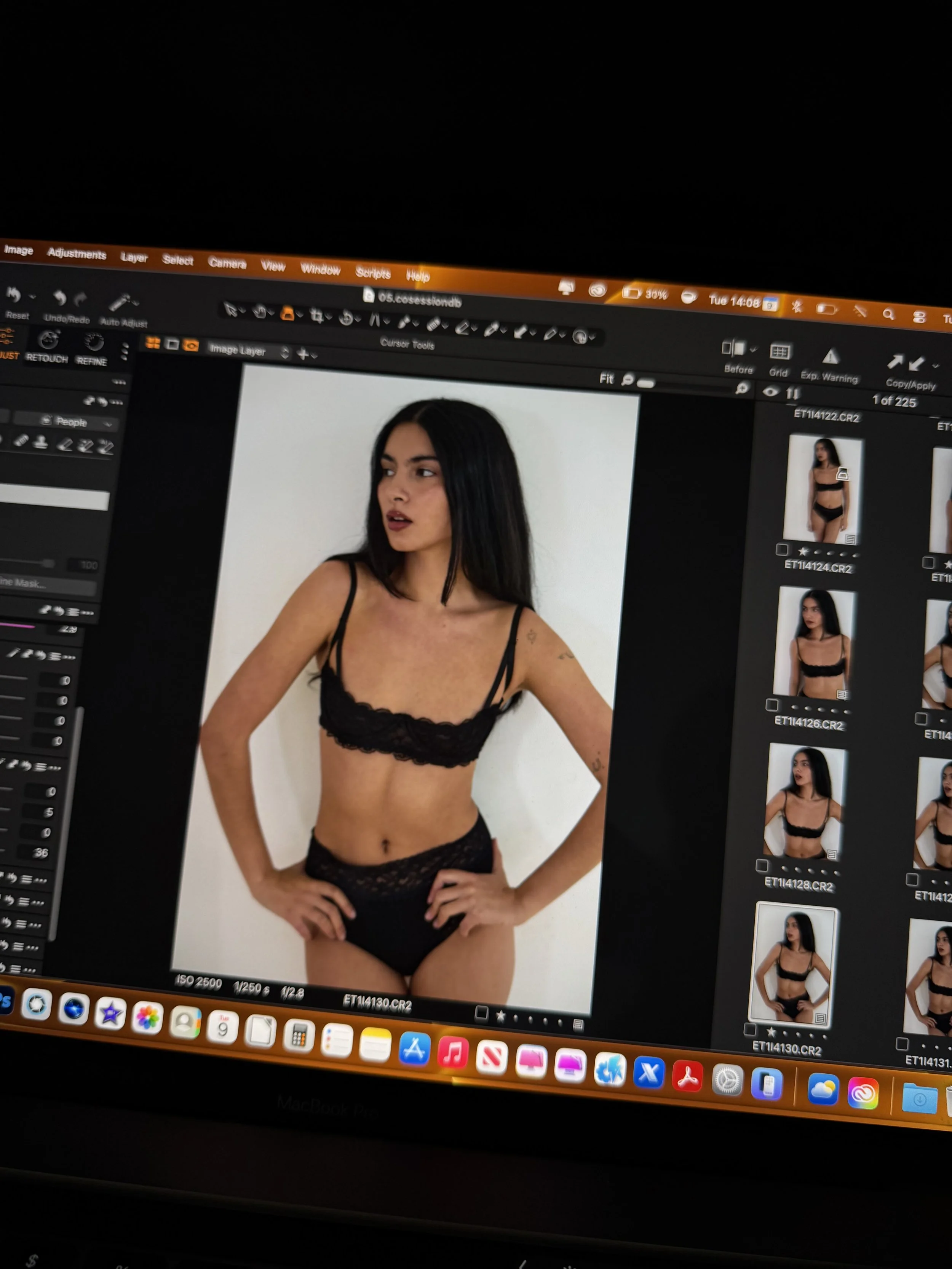 Digital photo editing screen showing a woman in black lingerie posing against a white background.