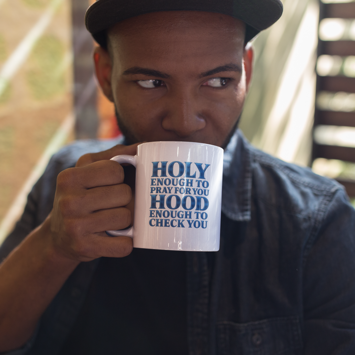 mug-mockup-of-a-young-black-man-drinking-a-hot-beverage-a12294.png