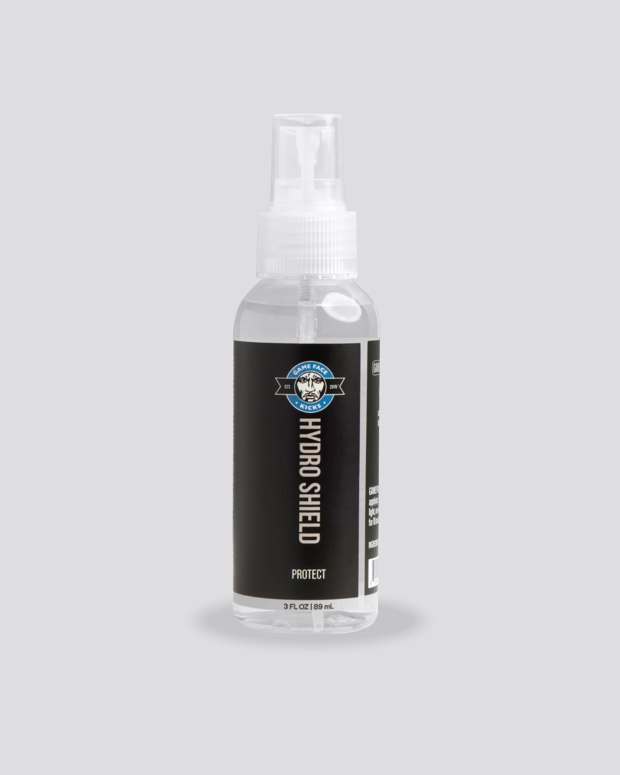 Clear spray bottle with a black label and spray nozzle, containing disinfectant labeled "HYDRO SANITIZER" with the brand logo and the words "PROTECT" visible.