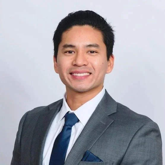 Professional man in suit smiling at the camera