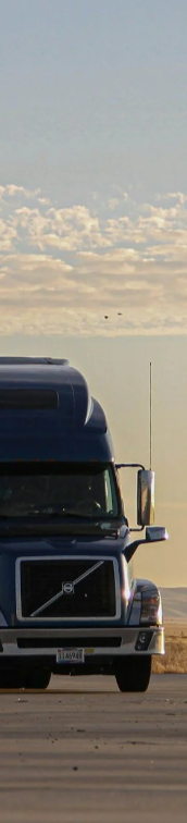 Heavy goods vehicle operating on a transport route, representing transportation, logistics and commercial fleet risks.