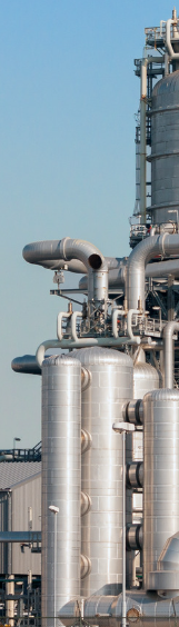 Industrial refining facility and processing equipment representing downstream refining and energy distribution operations.