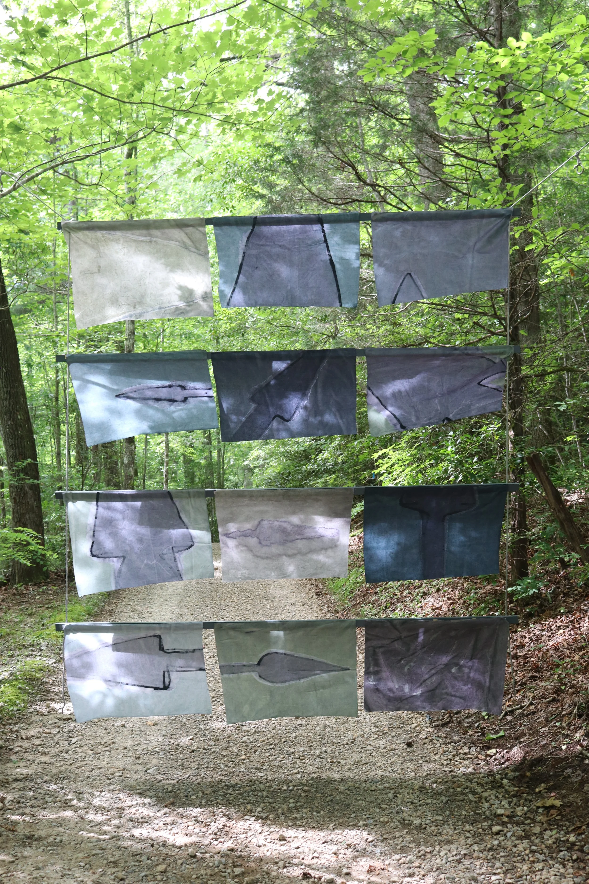 Song of Amergin (Floating, outdoors), Am bri i fodb fras feochtu/I am the head of the spear in battle, Acrylic, dye, muslin, rope, 120” X 96," Installation at the Hambidge Center for the Arts, Rabun Gap, GA, 2019, installation view iii