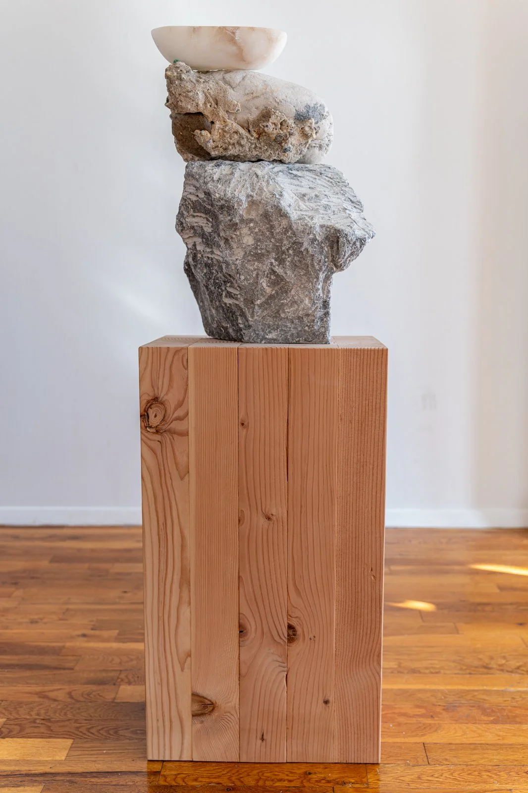 We Were Out At Sea And The Wind Was Getting Up And We Knew We Must Go Back To The Bay And The Wind Might Blow Us Home (Boat, Eye), 2024, Soapstone, beach stone, alabaster, 48.5” X 16” X 9.5”

Photo credit: Benjamin Koditschek