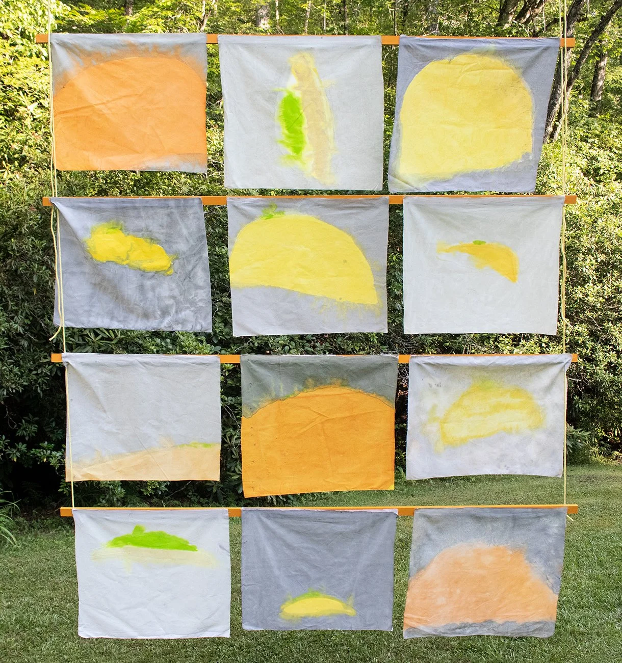 Song of Amergin (Floating with support, outdoors),  Am séig i n-aill/I am the tear of the sun, Acrylic, dye, muslin, rope, wood, cinder blocks, 120” X 96”, Installation at the Hambidge Center for the Arts, Rabun Gap, GA, 2019