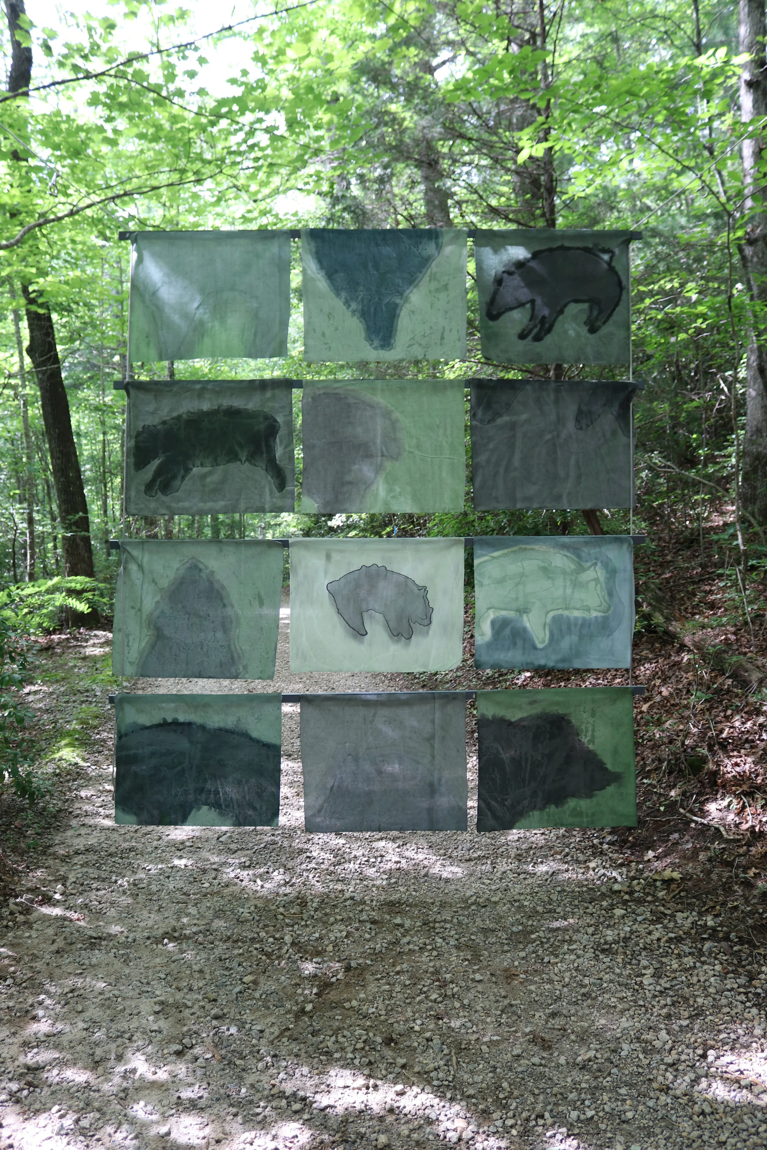 Song of Amergin (Floating, outdoors), Am Torc Ar Gail/I Am A Strong Wild Boar, Acrylic, dye, muslin, rope, 120” X 96”, Installation at the Hambidge Center for the Arts, Rabun Gap, GA, 2019, view i