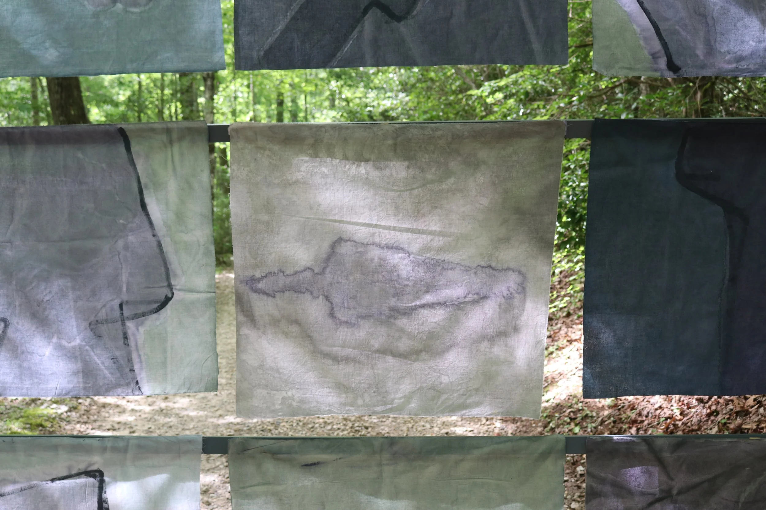 Song of Amergin (Floating, outdoors), Am bri i fodb fras feochtu/I am the head of the spear in battle, Acrylic, dye, muslin, rope, 120” X 96," Installation at the Hambidge Center for the Arts, Rabun Gap, GA, 2019, (detail ii)